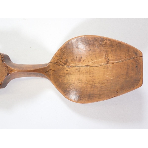 1083 - A late 18th century/early 19th century Welsh love spoon carved hearts and flowers, 18.5cm