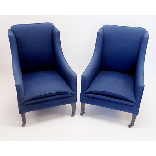 1291 - A pair of Edwardian blue upholstered small tub chairs on square tapered supports, 57cm wide