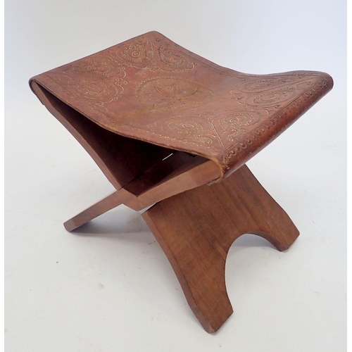 1322 - A camel saddle stool, 39cm wide