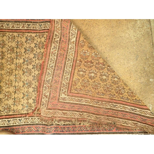 1341 - A Turkish runner with multiple guls on an ochre ground, 390 x 97cm