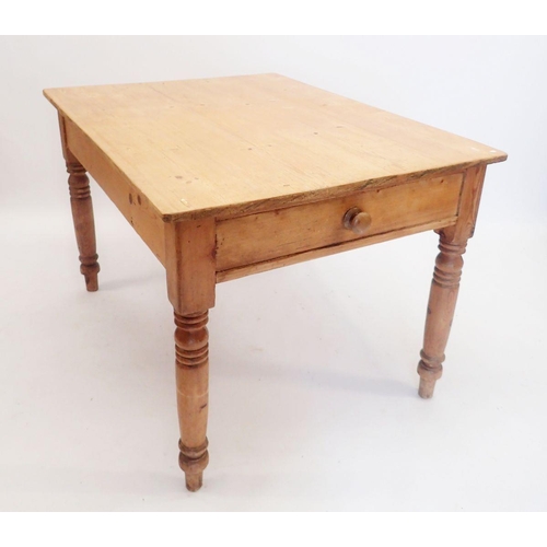 1344 - A Victorian pine kitchen dining table on turned supports with drawer, 112 x 85 x 73cm tall