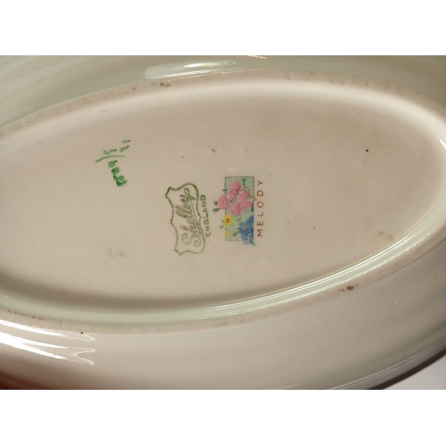 144 - A Shelley Melody group comprising two oval dishes, coffee mug, two saucers, pepper and a pin dish (p... 