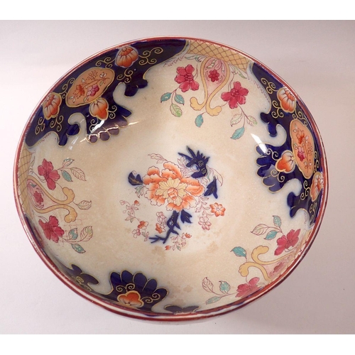 186 - A Thomas Shirley, Clyde Pottery large fruit bowl with floral decoration, 28cm diameter