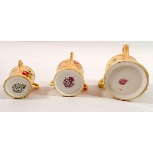 193 - A Royal Worcester three handled miniature tyg painted flowers on an ivory blush ground and two small... 