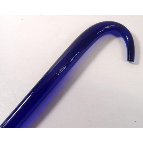 249 - A Bristol blue glass walking cane, 117cm long