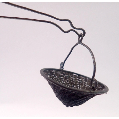 279 - A Chinese white metal filigree coolie hat form tea strainer