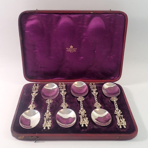 382 - A Victorian set of six silver Dutch style serving spoons with king and queen terminals, cased, Londo... 