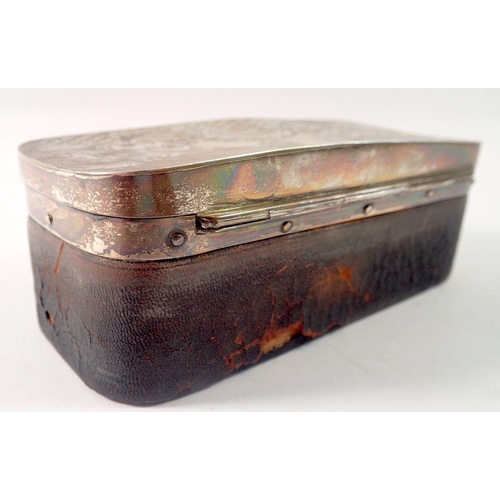 383 - A silver mounted leather toiletry box with engraved scrollwork decoration, Sheffield 1905, 16 x 7cm ... 