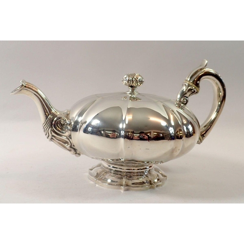 389 - A Victorian silver melon form teapot with foliage and bird finial, Edinburgh 1828 by GP, 735g