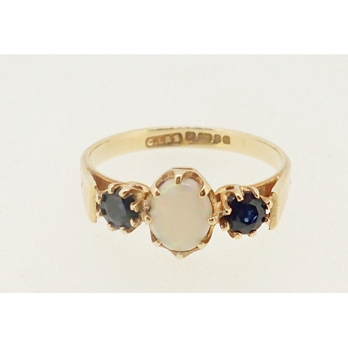 406 - A 9 carat gold opal and sapphire ring, size M, 1.7g