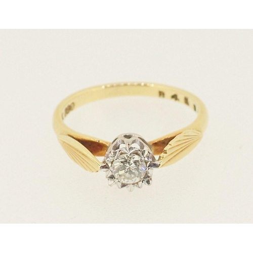 409 - An 18 carat gold illusion set diamond ring, size M, 2.7g