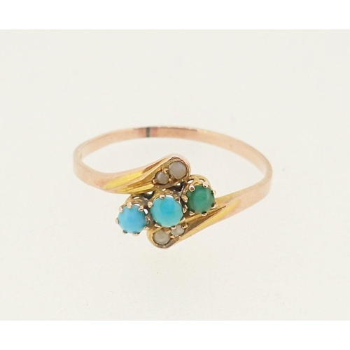 414 - A 9 carat gold ring crossover set three turquoise and seed pearls, 1.2g, size N