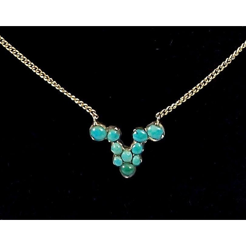 452 - A 9 carat turquoise set pendant and chain, 4.6g, 1.8cm wide