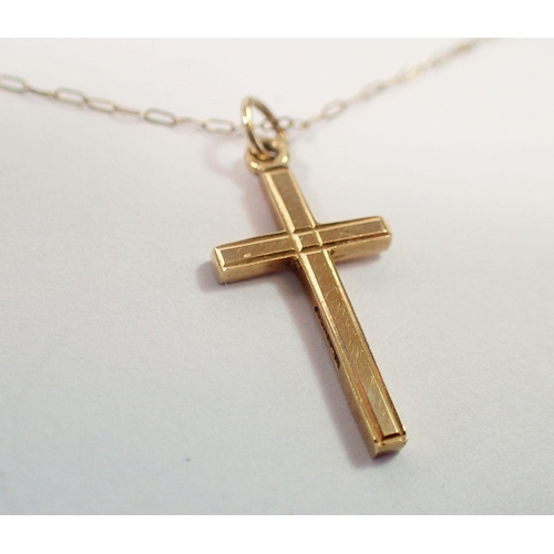 457 - A 9 carat gold crucifix and chain, 1.3g