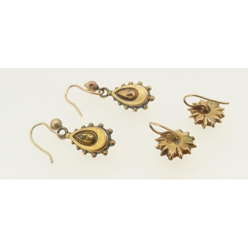 464 - A pair of Victorian yellow metal pendant earrings and a 9 carat gold pair of earrings set red stones... 