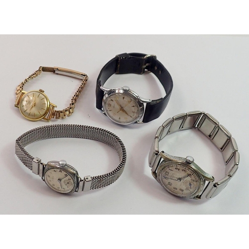 656 - A group of four vintage mechanical watches including Avia, Oris etc.