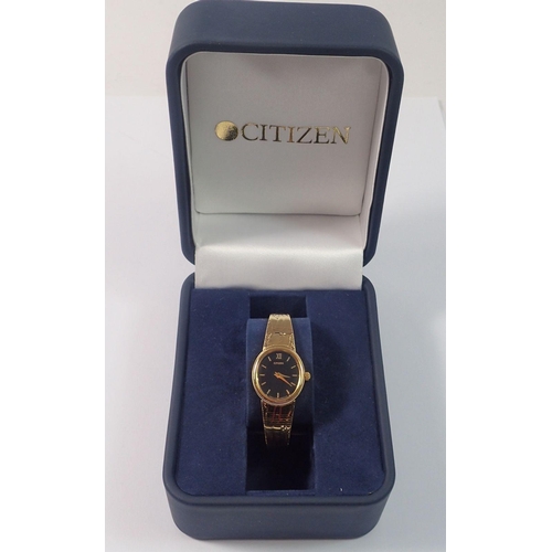 658 - A Citizen ladies gold plated quartz watch, boxed