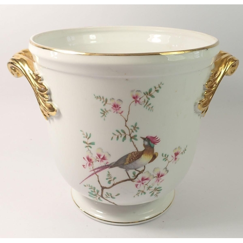 67 - A large Portuguese porcelain jardiniere painted exotic bird, 23cm tall