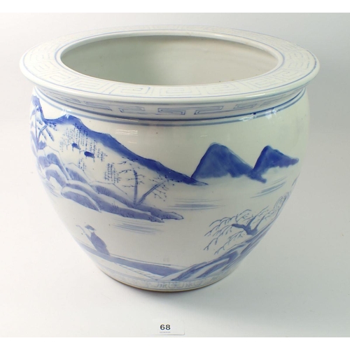 68 - A Chinese blue and white jardiniere painted landscapes 24cm tall