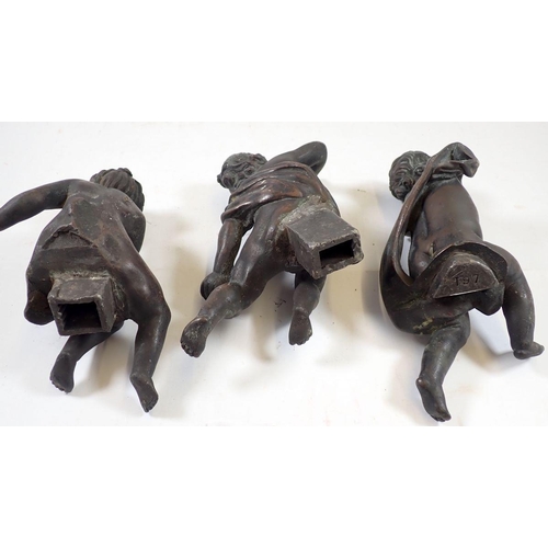 801 - Three antique cast lead putti figures with fittings to bases, 20cm tall approx