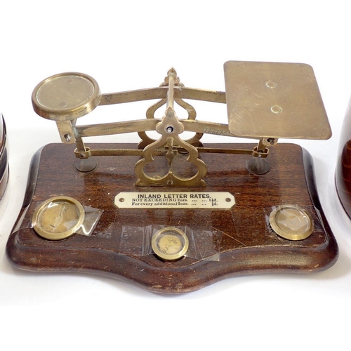 804 - A set of Edwardian postal scales, 19cm wide and two oak and chrome biscuit barrels, 16cm tall