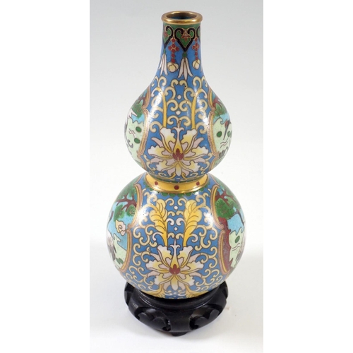 817 - A Japanese enamel double gourd form cloisonné enamel vase decorated cranes and flowers, 16cm tall