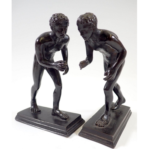 819 - A pair of bronze Grecian style naked athletes, 12.5cm tall