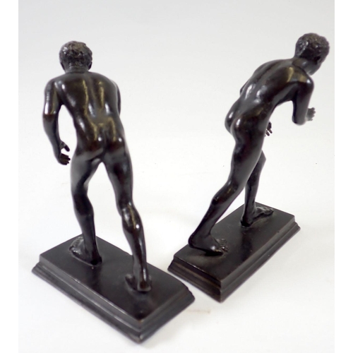 819 - A pair of bronze Grecian style naked athletes, 12.5cm tall