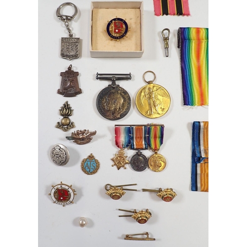 856 - A small group of military items including WWI pair to 2nd lieutenant S F Legge RAF and set of three ... 