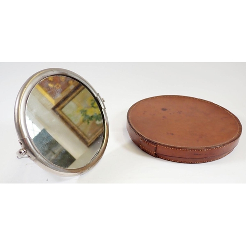 889 - An Edwardian circular plated gentlemen's easel mirror in leather case and photograph frame