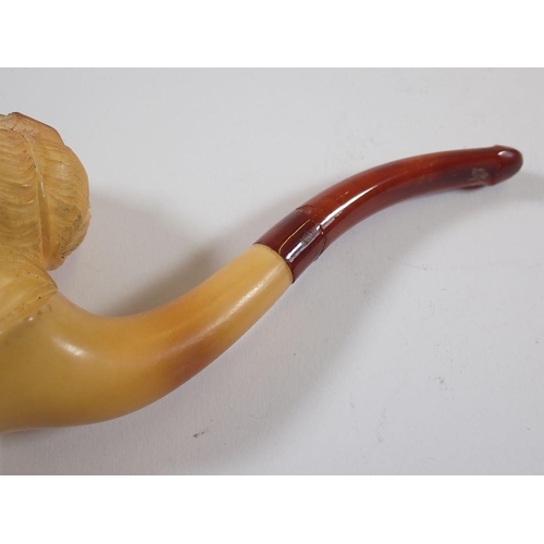 897 - A meerschaum pipe in the form of a ladies head, cased, stem a/f