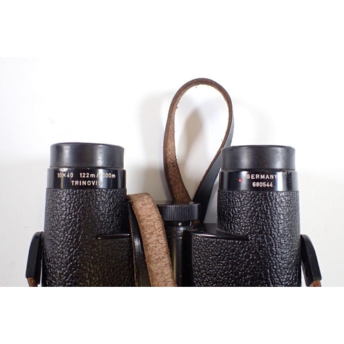 906 - A pair of Leitz Trinovid, 10 x 40 binoculars with case, lenses in good condition