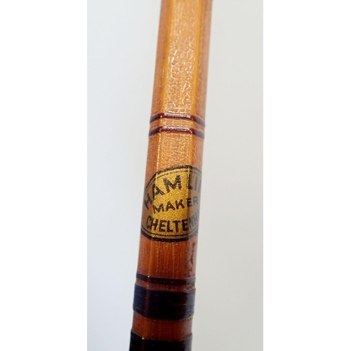 911 - A two piece split cane fishing rod by Hamlin Cheltenham in brown cloth bag and two wooden fishing re... 