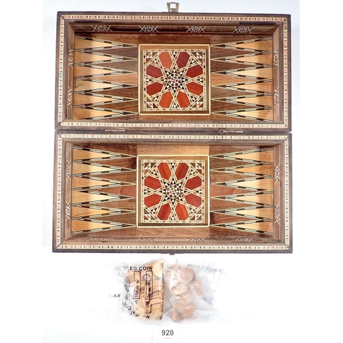 920 - A marquetry backgammon game plus a wooden animal puzzle