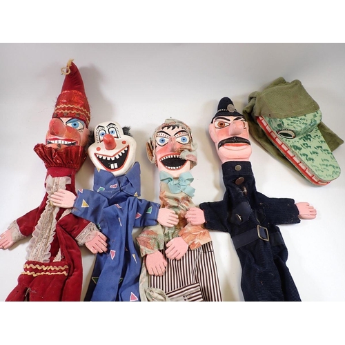 931 - A vintage set of five large painted wood Punch & Judy hand puppets