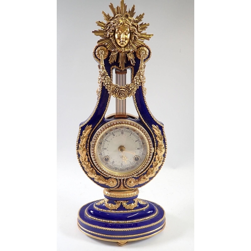 942 - A V&A Marie Antoinette porcelain lyre form mantel clock, 40cm