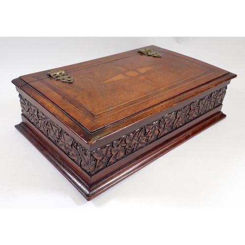 951 - A Victorian mahogany box with star inlay and carved border, 19 x 31 x 9cm