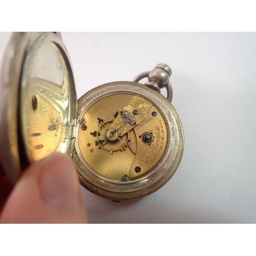 653 - A Waltham silver plated keyless wind 'American' pocket watch and key by P S Bartlett, No. 3387888