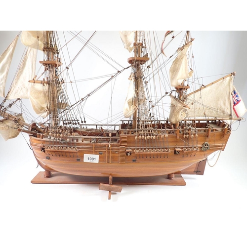 1001 - A wooden model three masted sailing ship, 78cm tall