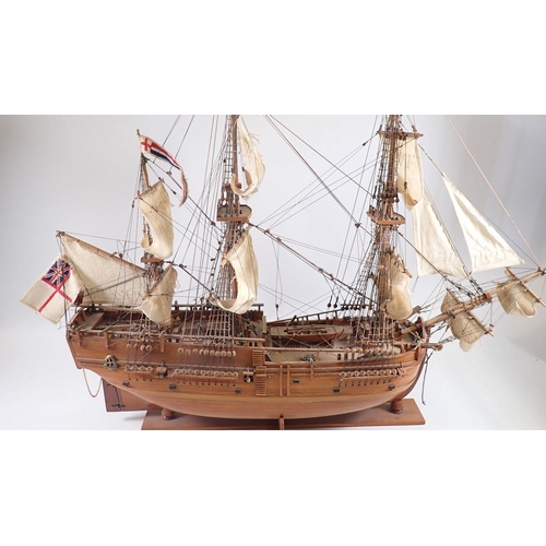 1001 - A wooden model three masted sailing ship, 78cm tall