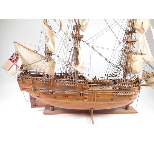 1001 - A wooden model three masted sailing ship, 78cm tall