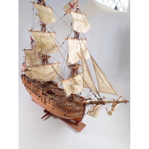 1001 - A wooden model three masted sailing ship, 78cm tall