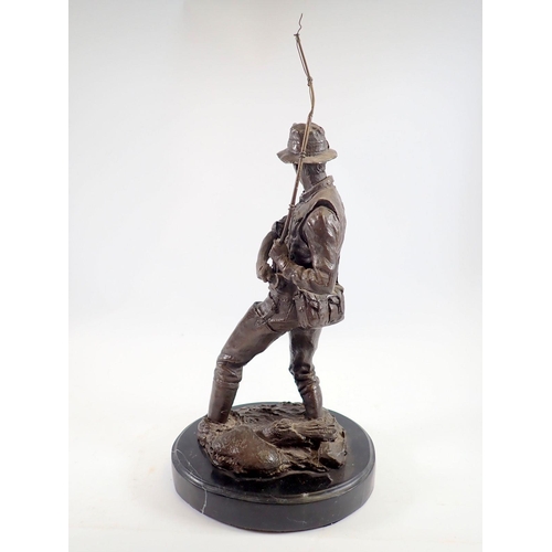 1002 - A bronze finish figure of a fisherman after Milo on marble base, 41cm tall