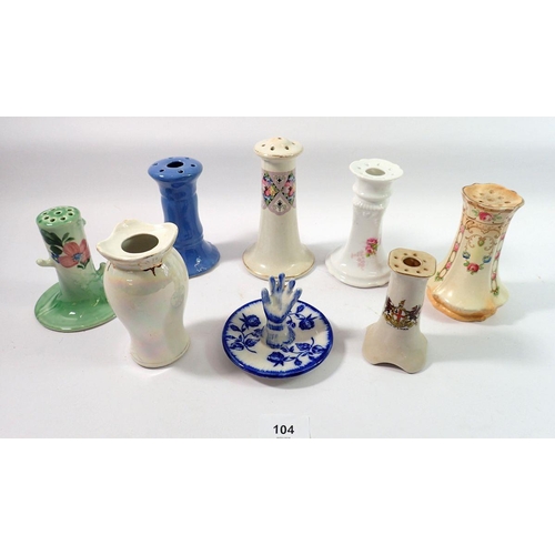 104 - A collection of china hatpin stands