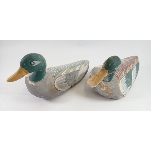 1044 - Two Folk Art painted wooden decoy ducks, 29cm long