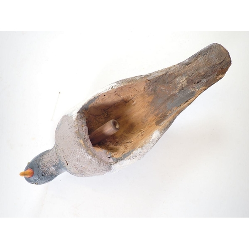 1045 - An unusual mounted mid 20th century 'perching' decoy pigeon, 52cm tall