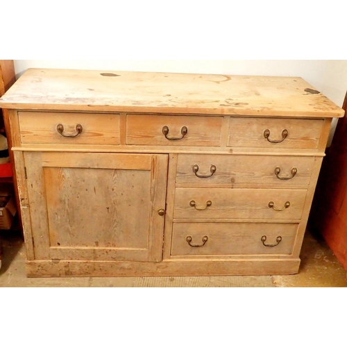 1048 - A 19th century pine side cabinet with three frieze drawers over cupboard and three further drawers, ... 