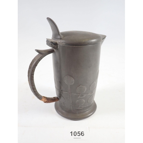 1056 - A Tudric pewter Arts & Crafts hot water jug by Archibald Knox for Liberty, No 0967