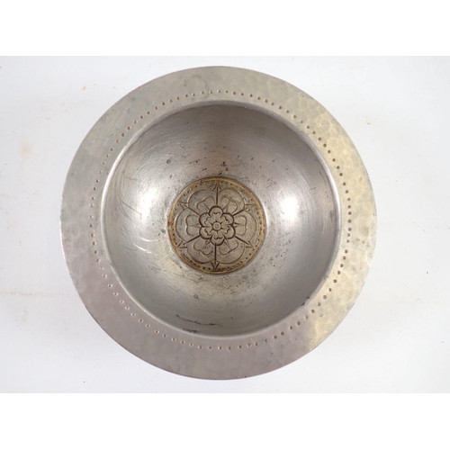 1068 - A set of four unusual Tudric pewter small dishes with Tudor Rose to base, made for Liberty, No 01122... 