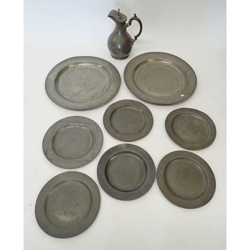 1072 - Two early 19th century pewter platters, six plates and an Ashberry & Son ewer